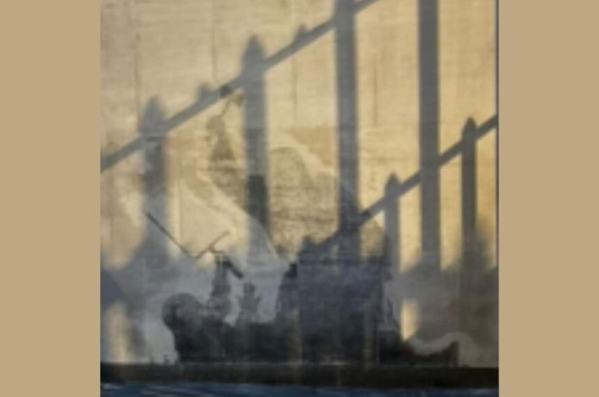 Behind bars and erased, Banksy's art speaks louder than ever