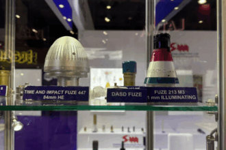 Green MP spots banned cluster bombs at London arms fair