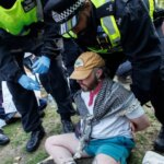 Judge bails Defend Our Juries spokespeople following dawn raids