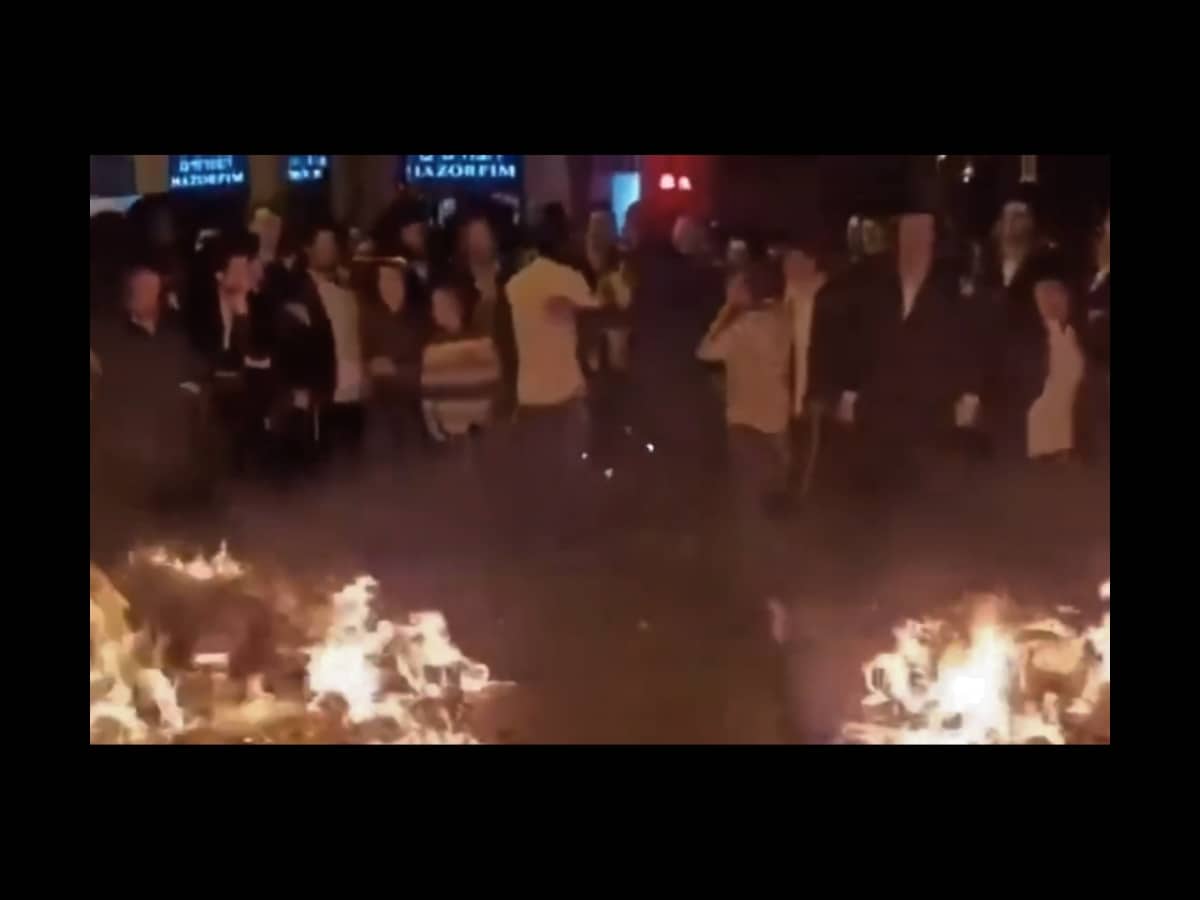 Israeli flag burned by anti-Zionist Jews during protests