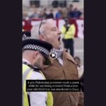 Protester reads poem about murdered child as he's being arrested