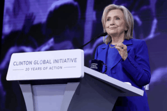 Protesters call out Queen's Uni Belfast links to Hillary Clinton again