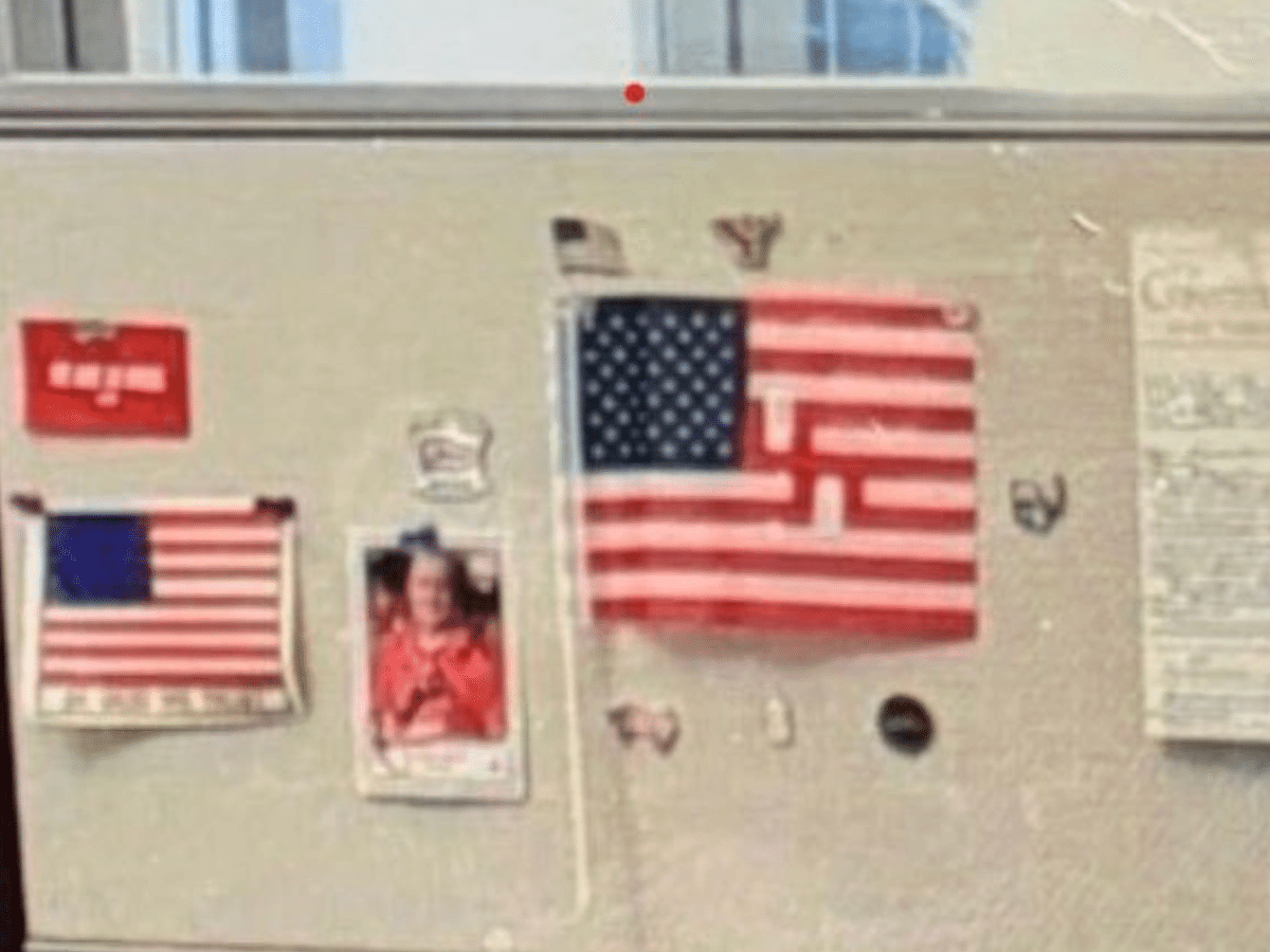 Republican Congressman caught with swastika flag on office wall