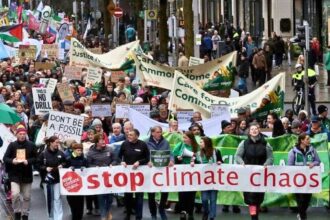 Climate rallies in Dublin and Belfast demand end to fossil fuels