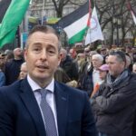 Givan under pressure as outrage over trip to Israel grows