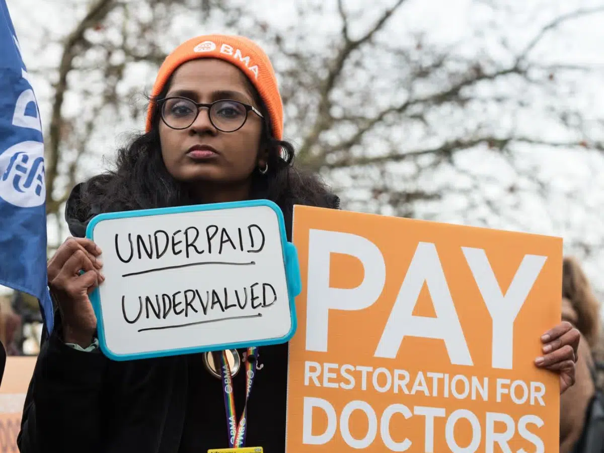 PM threatens to axe thousands of training positions