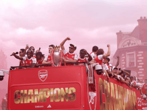 Read more about the article Arsenal crowned champions as fans protest sponsor Deel